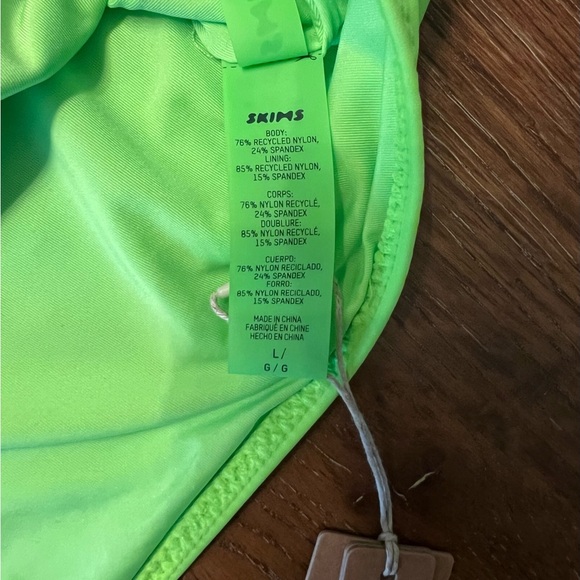 SKIMS Neon Green Long Sleeve Crop Top and Mini Skirt Set - Picture 9 of 9